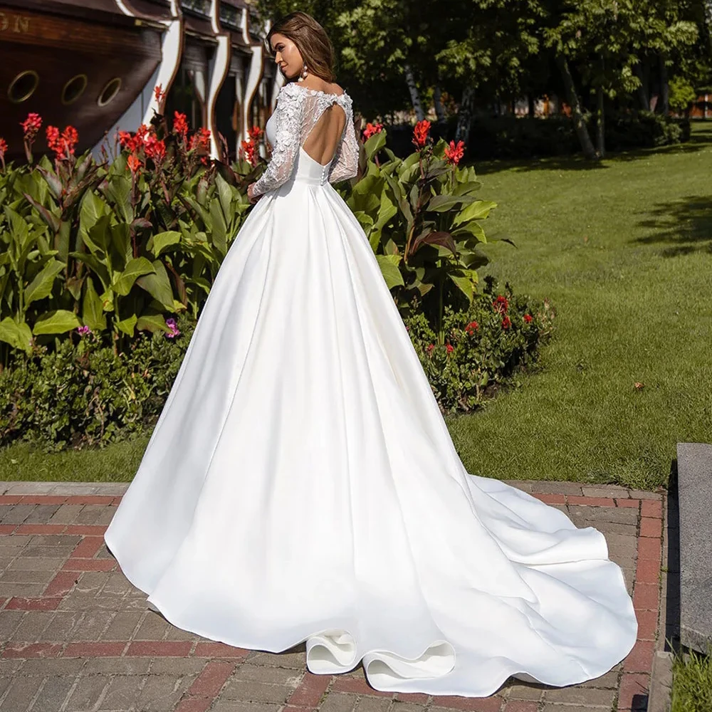 Graceful Boat Neck Satin Wedding Dress 3D Appliques Beading Lace Long Sleeves Open Back A Line Bridal Gown Robe De Mariée