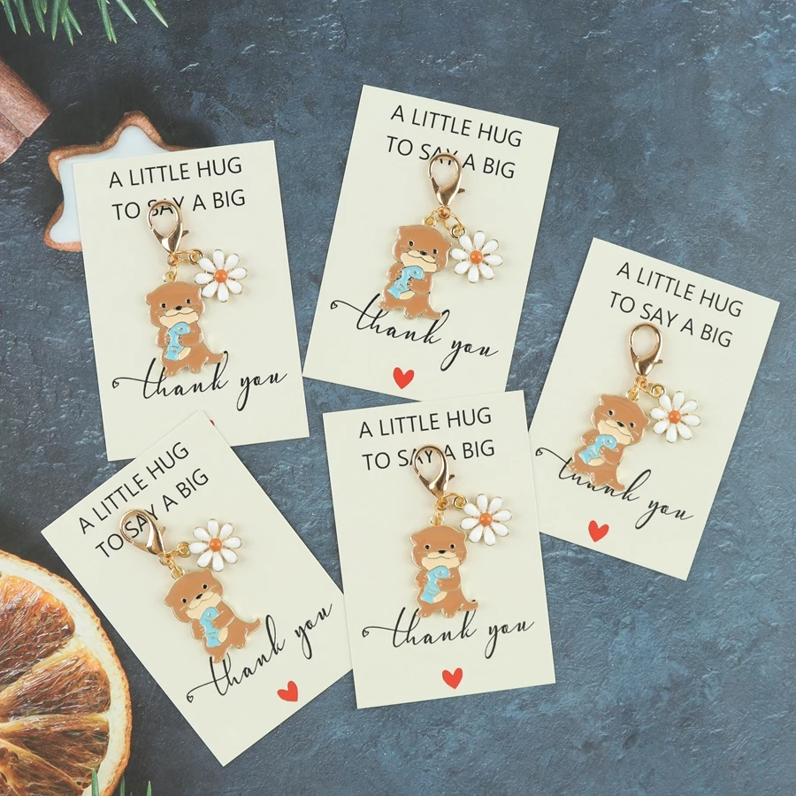 1pc/2pcs/5pcs of cute small otters and flower-shaped keychain with a thank-you card, animal-themed hanging decoratio