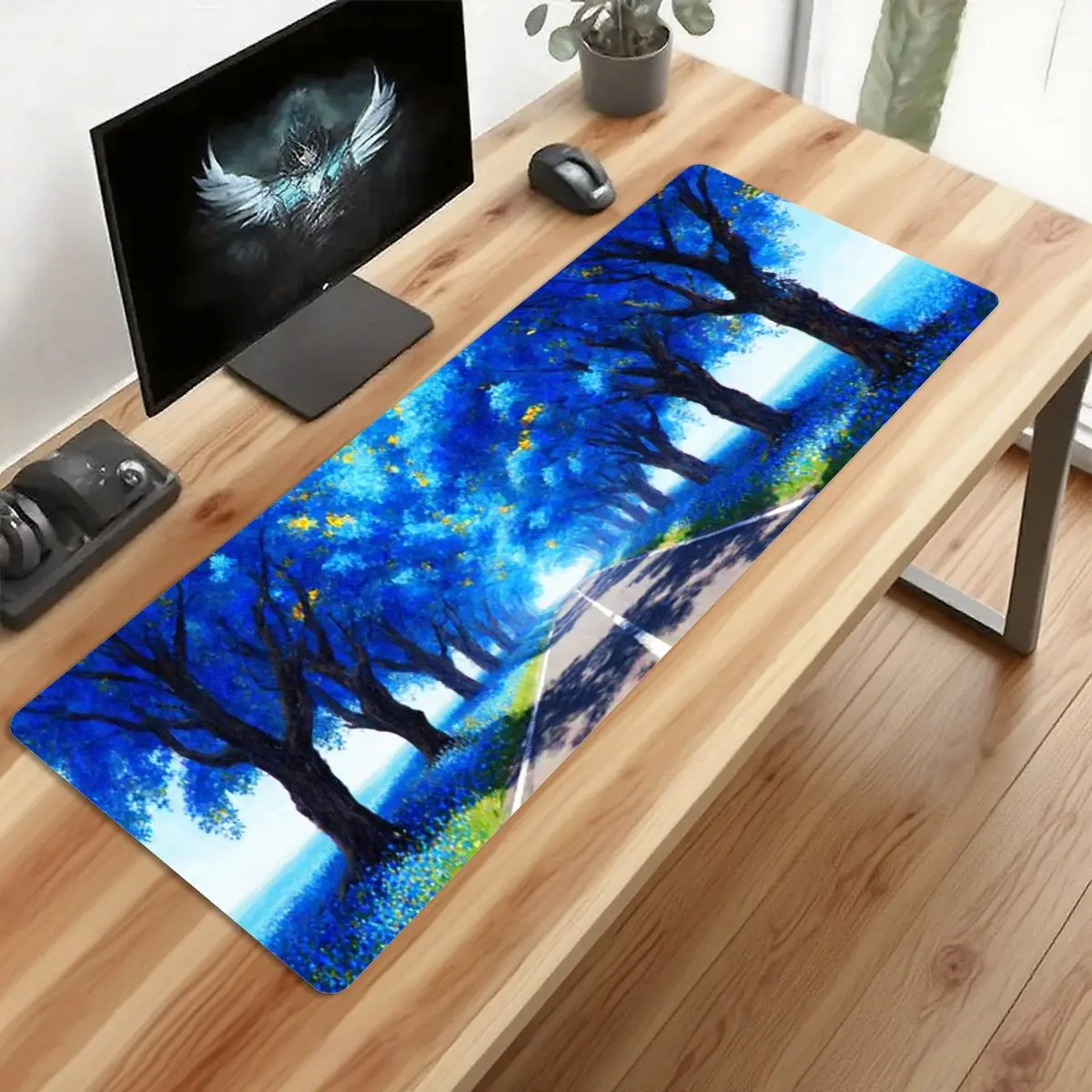 Scenic Blue Tree Lane Desk Mat, 31.5in x 11.8in, non-slip base, vibrant HD print, perfect for gaming and office use.