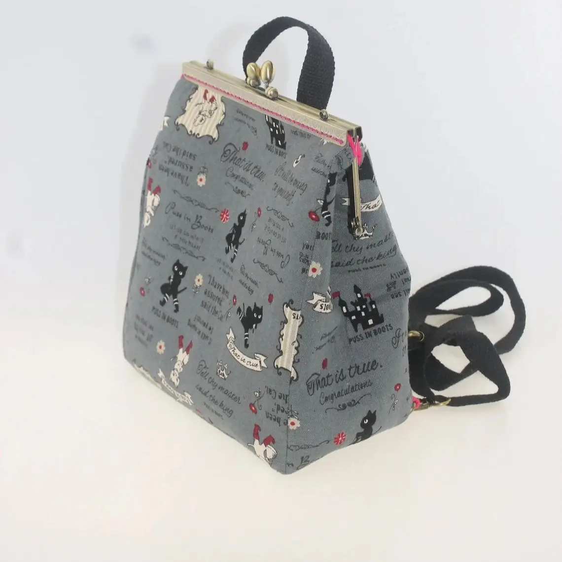 

Lost In Vintage Large Size Puss in Boots Print Kiss Lock Convertible Backpack or Crossbody or Shoulder-bag with Metal 23x10x20cm