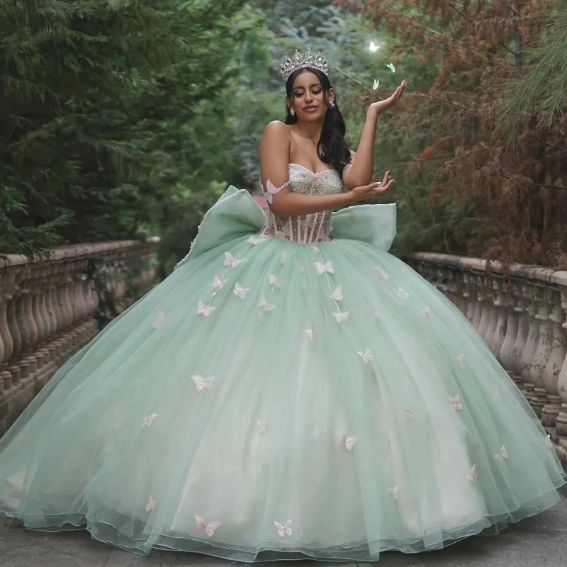 Vestidos de Quinceañera de princesa hinchados brillantes, verde claro, hombros descubiertos, cordones, cuentas de lazo, corsé, tren de la capilla, dulce 15