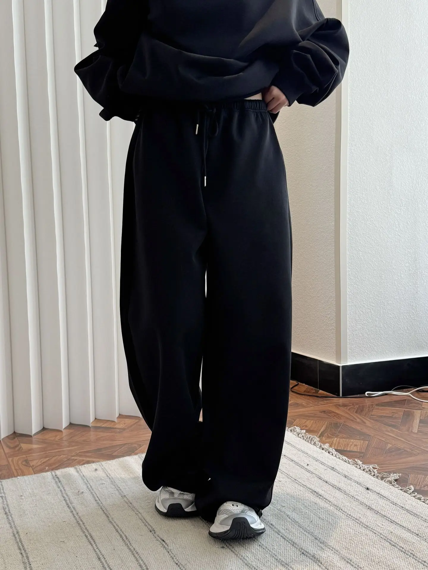 

woman cozy trousers from set without sweatshirt