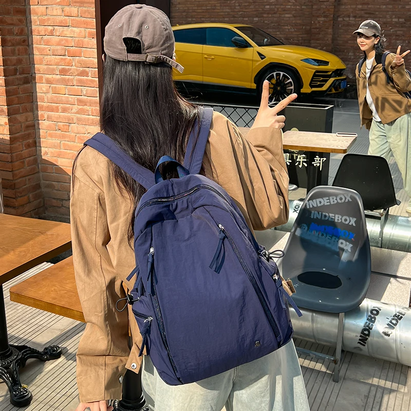 Waterproof Nylon Backpacks Women Large Capacity Solid Leisure Or Travel Bags Solid Black Light School Bags Korea Style Packages
