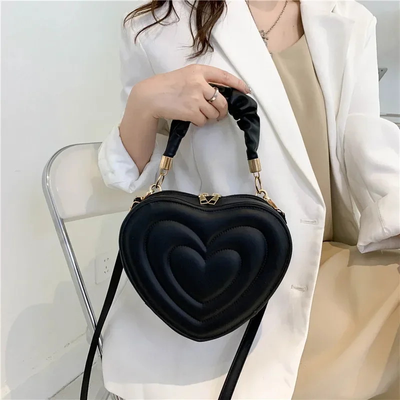 Retro heart-shaped cute bag fashion shoulder messenger bag solid color girl new shopping handbag