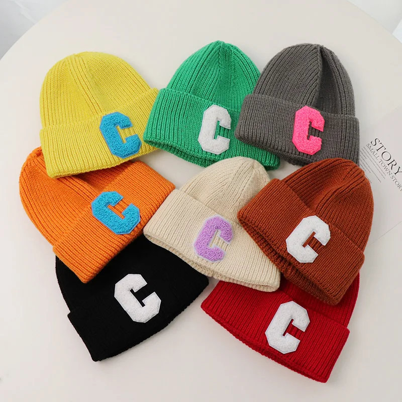 C letter knitted hat Warm boys and girls Korean autumn and winter thickened wool hat candy color simple ear protection hat