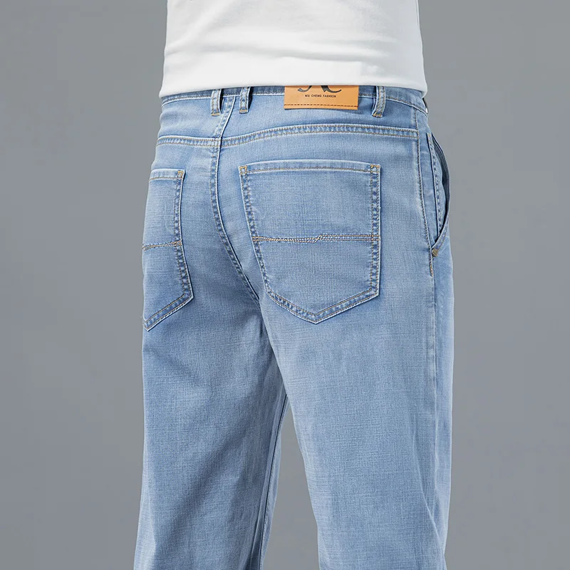 Lyocell tessuto estate Jeans da uomo ultrasottili morbido drappo sciolto dritto marchio Casual Denim pantaloni Street gamba larga pantaloni