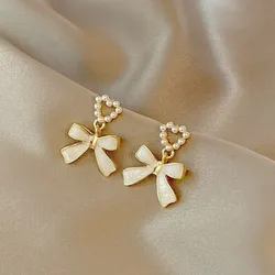 925 Silver Needle Korean Fashion White Bow Drop Earrings For Women Jewelry 2026 Trending New Women's French Pearl Earrings JN9