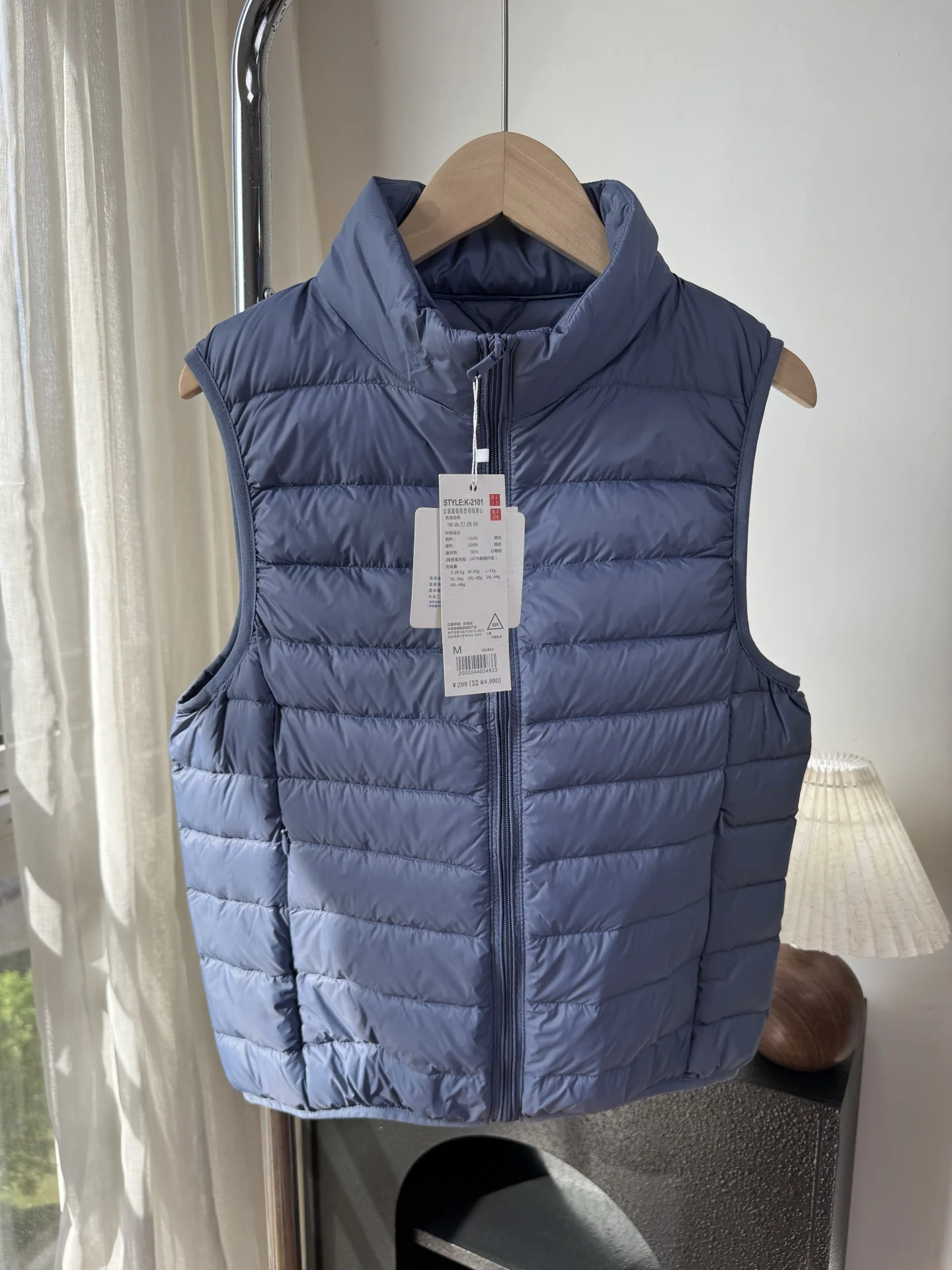 新しい軽量レディースダウンベスト秋オールマッチスタンドアップカラーコートシンプルな無地通勤ノースリーブトップ