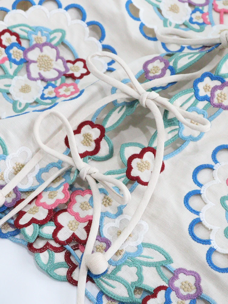 

HEIDD SE Youthful Hollow out Embroidered Cotton Linen irt V Ne Tied Floral Print Loose Fit Long Sve ort Length