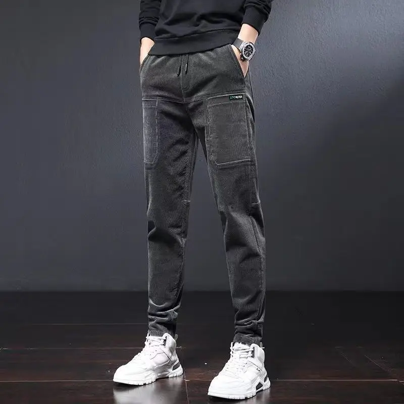 Pantalones informales de vendaje de pana empalmados con bolsillos sueltos para hombre, pantalones de gran tamaño de Color sólido que combinan con todo, moda de otoño e invierno, 2023