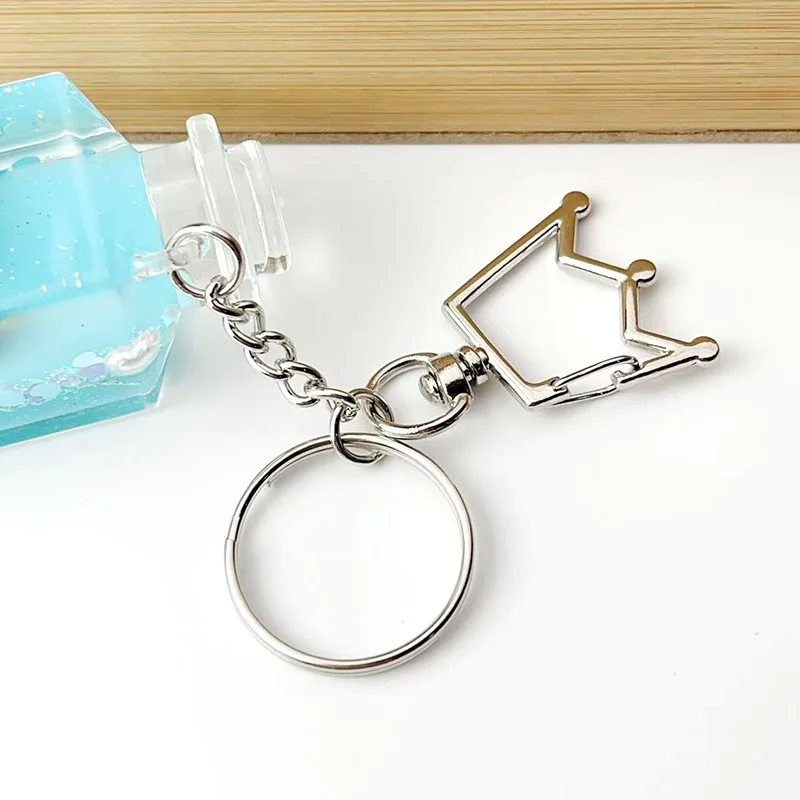 12–24 Stück runde Schlüsselanhänger, drehbare Verschlüsse, Katapult-Verschlüsse, Kronen-Schlüsselanhänger, DIY-Schmuck, Spielzeug, Herstellung, Anhänger, Links, Zubehör – Detail 2