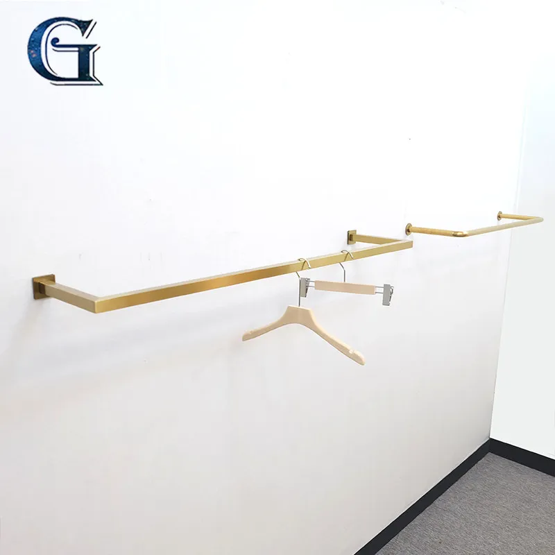 

Clothing store display rack, wall-mounted gold wall clothes hanger