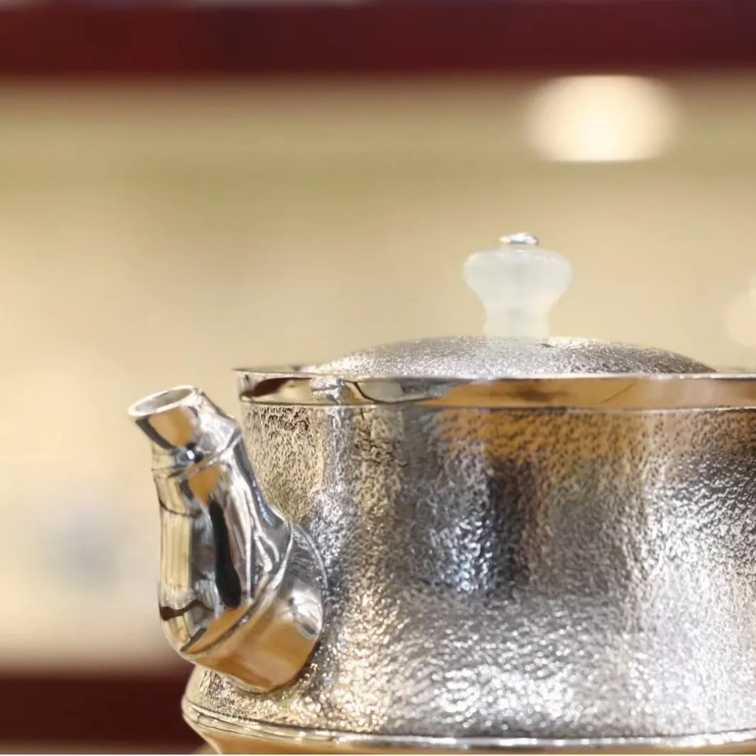 Jade handle silver pot 999 sterling silver boiling water to make tea, single pot, one kung fu tea set, and a full silver brewing
