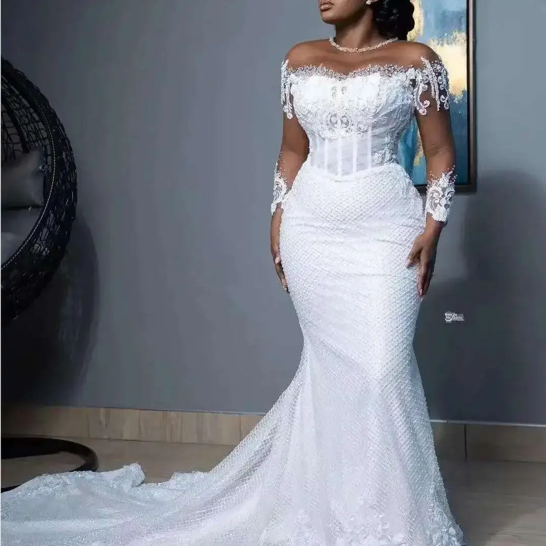 Aangepaste glanzende applicaties kralen trouwjurk Robe De Mariée plus size korset terug lange mouwen zeemeermin bruidsjurk