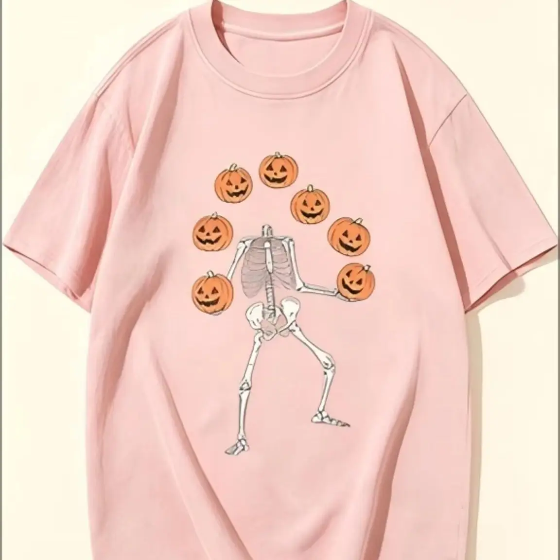 Halloween Skeleton Juggling Pumpkin Graphic T‑Shirt, Fun Fall Holiday Art Print Tee, Casual Short Sleeve Top for Party Daily