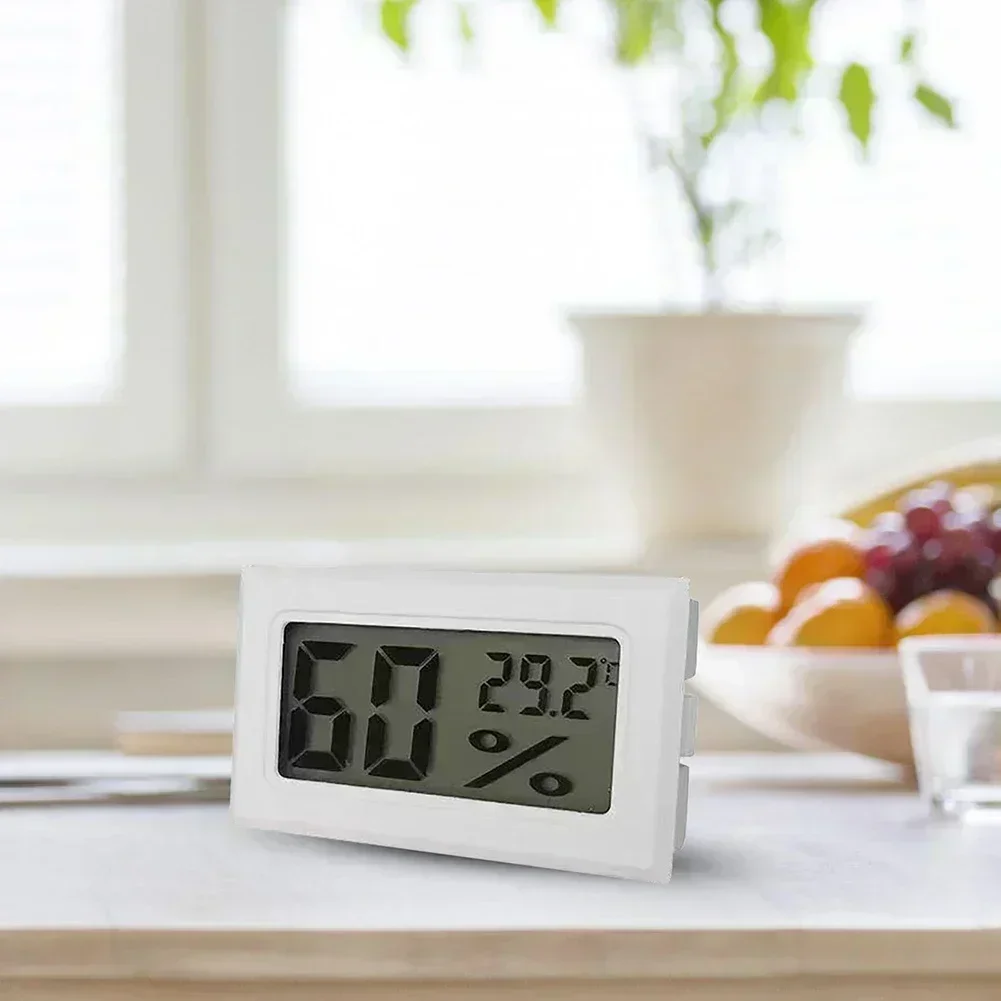 Digital temperature and humidity monitoring device with accurate sensor and large display compact and portable for indoor use
