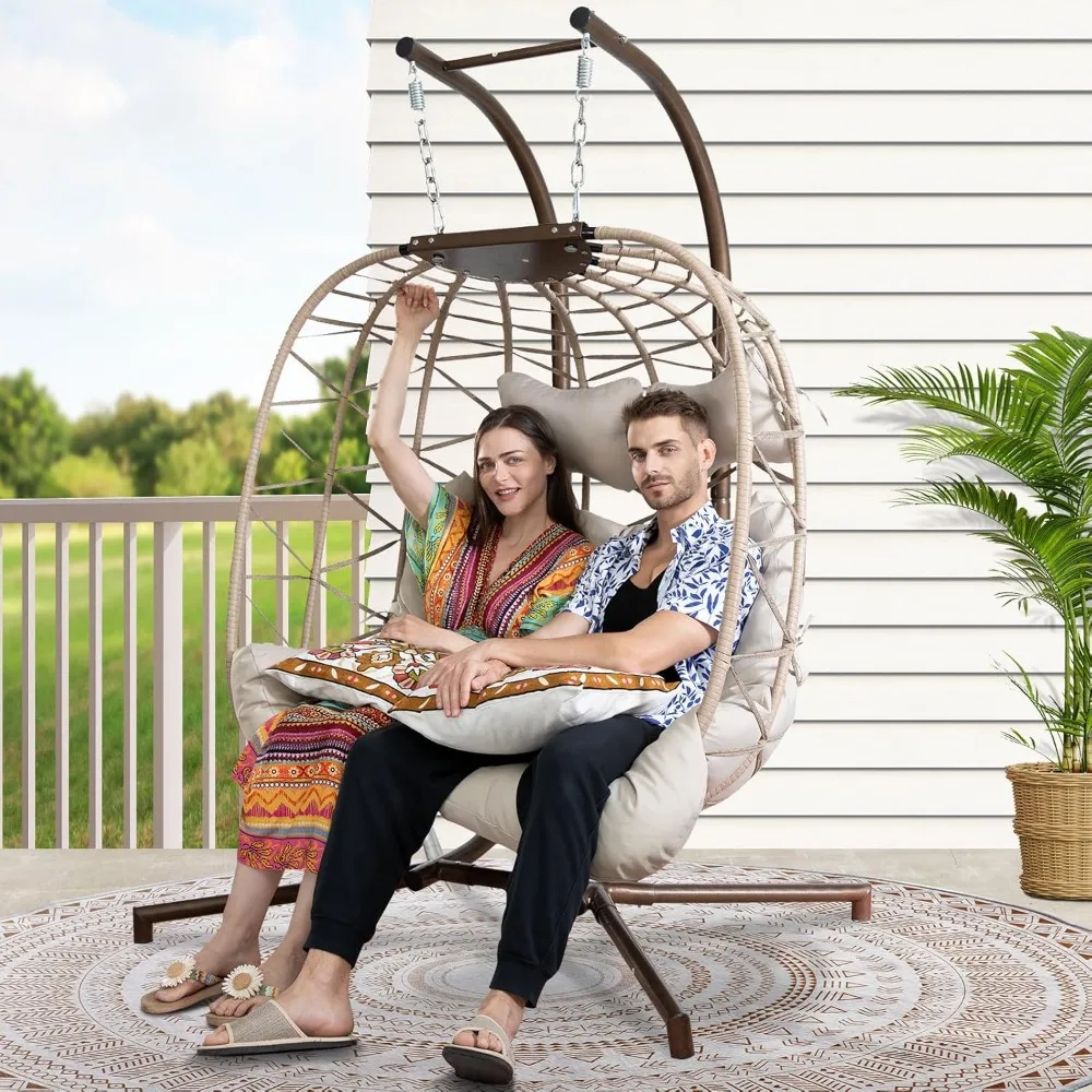 

durable oversized double egg swing chair for outdoor and indoor use, supporting up to 700lbs, wicker loveseat