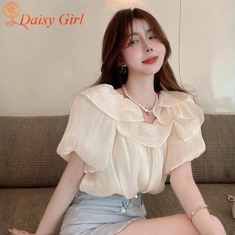 夏の新ソリッドカラーの気質ワンショルダーパフスリーブトップガールデザインニッチトップスフリルトレンディなオフショルダーシフォンシャツ
