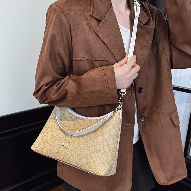 

Vintage Revival Large Crossbody with Aged Leather Patina and Roomy Interior for Weekend Getaways Exuding Timeless Elegance