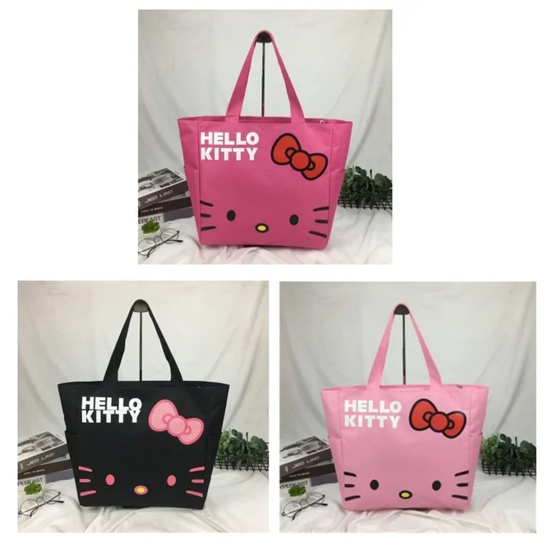 Hello Kitty-monederos y bolsos a la moda, bolsa de lona con dibujos animados, caja de viaje impermeable, Oxford impreso, estuche de compras plegable