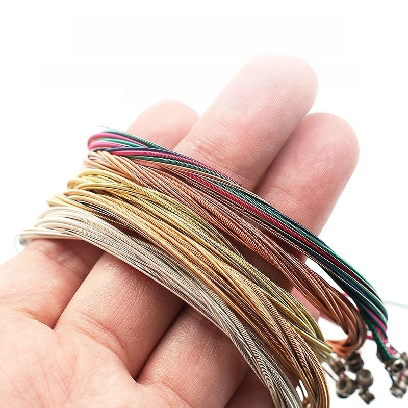 أوتار الجيتار: فوسفور برونزي، ملون، نحاس، مطلي بالفضة، مجموعة واحدة من 1-6 # ، مع قطع الغيار 1-3 #   متضمن كهدية