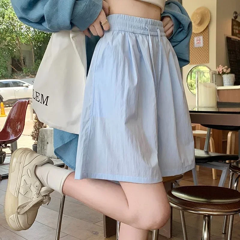 Nuove donne di seta del ghiaccio vacanza al mare pantaloni corti Lady comodi pantaloncini larghi a vita alta pantaloni larghi con coulisse solidi femminili