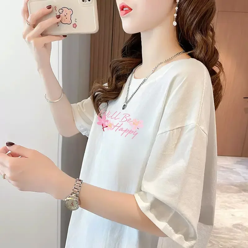 T-shirt a maniche corte da donna Top larghi da donna anni '90 Vintage con maniche Moda coreana Abiti giovanili Recensioni giapponesi Molti