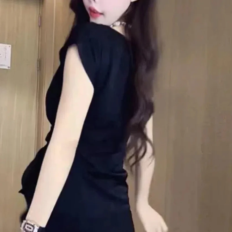 เสื้อผ้าสตรี2024เสื้อสวมหัวคอกลมแขนสั้นไม่สม่ำเสมอทรงหลวมมีสไตล์เสื้อลดอายุพิมพ์ลายเข้าได้กับทุกชุดฤดูร้อน