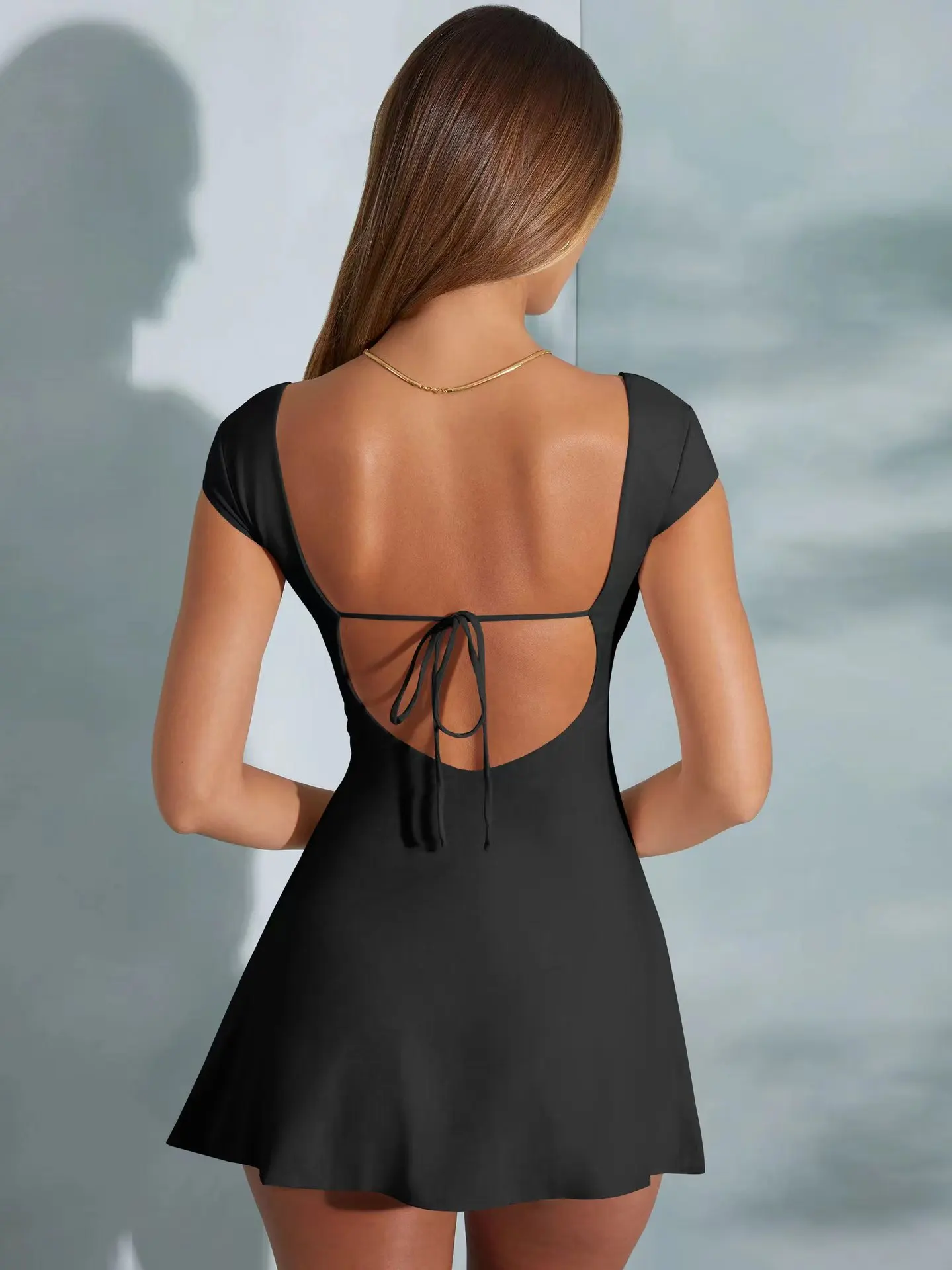Fashionable and sexy summer women's minimalist style short-sleeved backless A-line skirt high-end pure and lustful dress