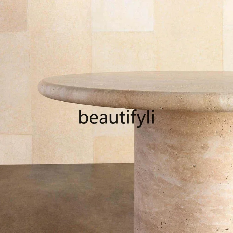 

xqqModern simple, fashionable and creative natural travertine dining table designer model light luxury restaurant dining table