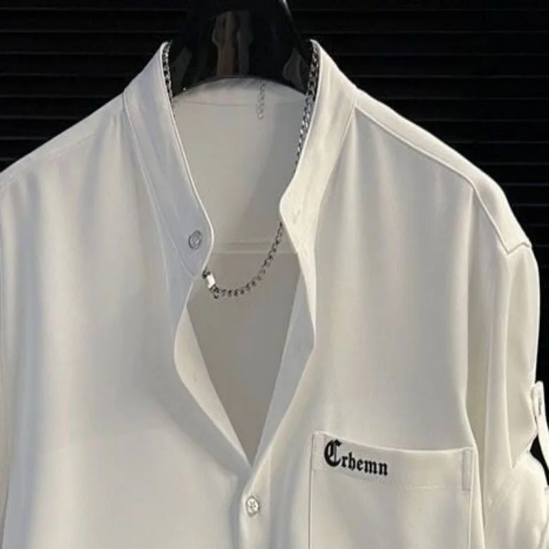 Solid color short sleeved shirt cardigan for boys in summer 2026, new high-end and cool shirt, trendy brand loose jacket