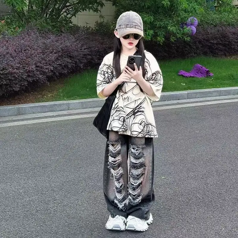 

Girls' Set 2025 Summer New Loose Casual American Street Explosion Short Sleeve T-shirt Heavy duty Piercing Jeans Two Piece Set