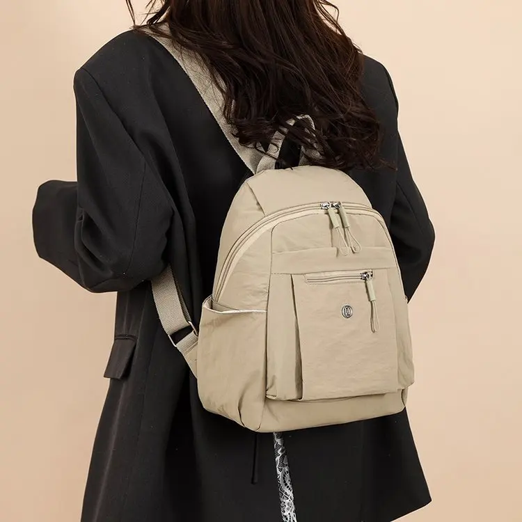 2025 nuevo bolso de mamá ligero impermeable de tela de buey Faion Color caramelo pequeño bolso de mujer Bapa correa de hombro suave