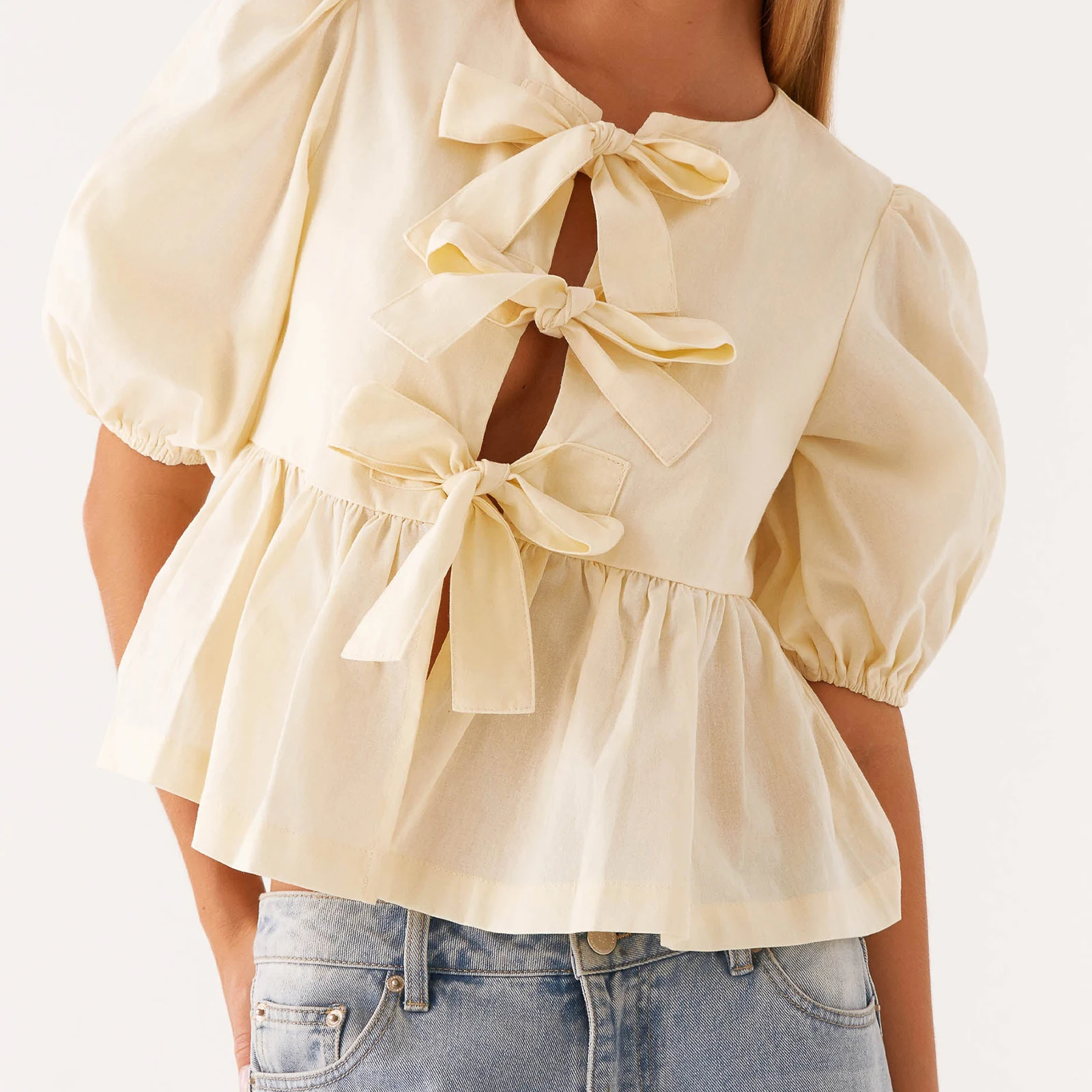 

Combhasaki Women Summer Shirts Casual Solid Color Tie Split Front Hollow Out Short Puff Sleeve Ruffle Hem Babydoll Blouse Tops