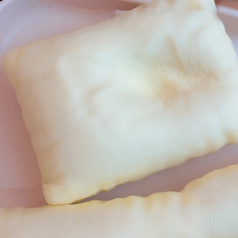 Almohada para gatitos, juguete de rebote lento de crecimiento lento, galleta de simulación, liberación de estrés, regalo para relajarse las manos