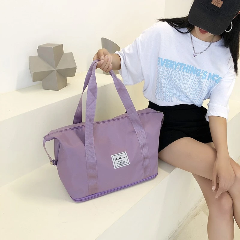 

Multi colored travel bag, large capacity expandable bottom, essential for travel, simple and stylish travel bag