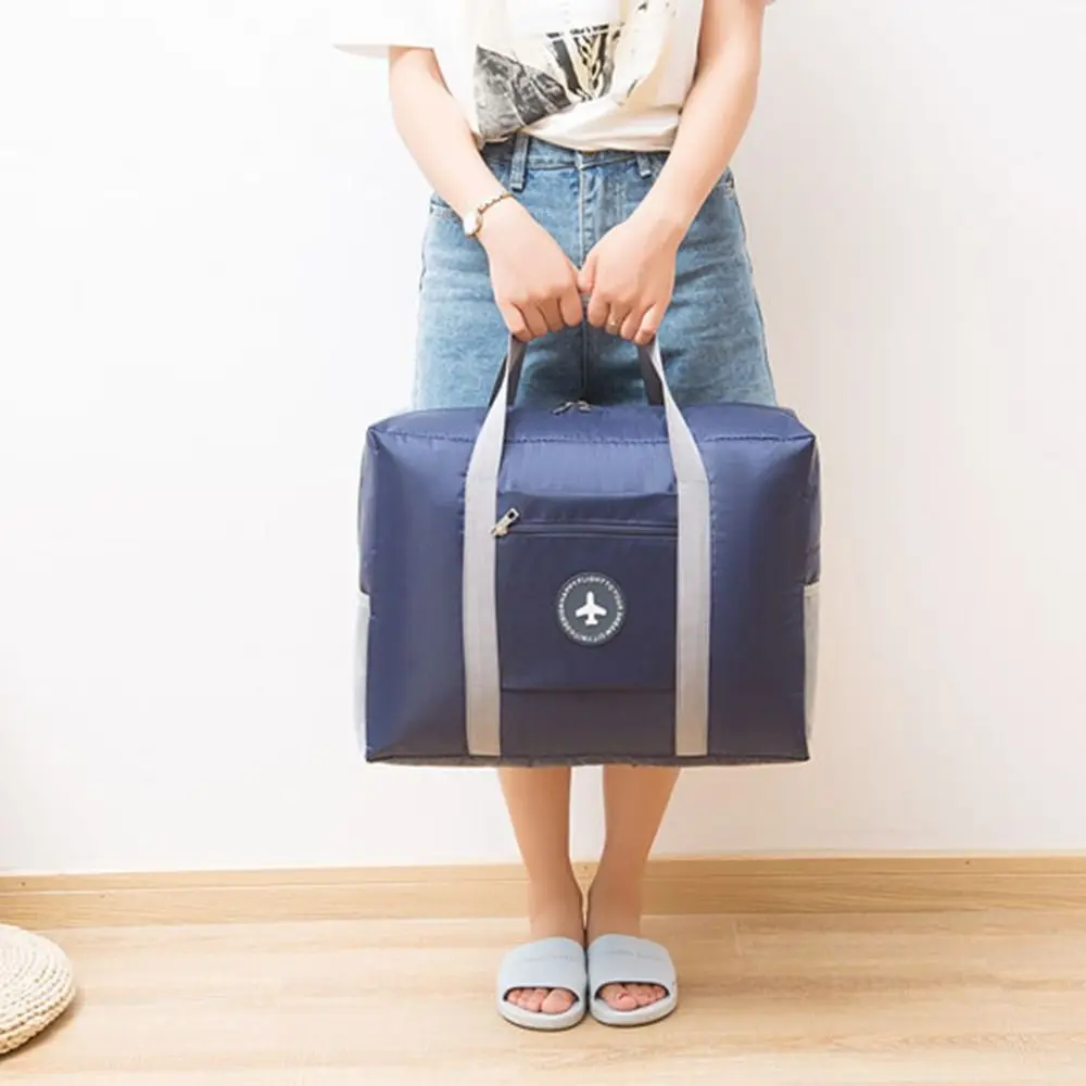 Bolsa de almacenamiento de moda, bolsa de lona plegable de poliéster, bolso de equipaje con cremallera, bolsas de viaje de gran capacidad, avión