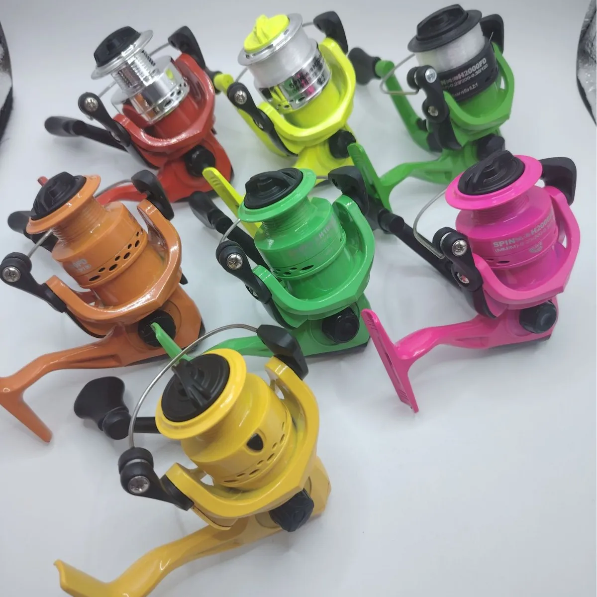Outlife Spinning Fishing Reel Size 200 Metal Spool Lightweight Smooth For Freshwater Saltwater Surf Casting Fishing Rod