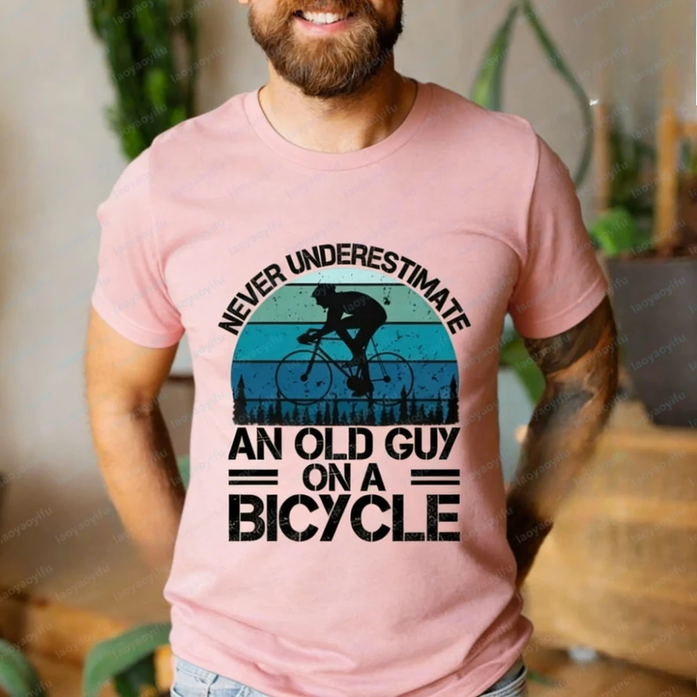 Funny Cyclist Cotton T-Shirt: Never Underestimate An Old Guy on A Bicycle Graphic T Shirts Harajuku Mens T Shirts Streetwear Top