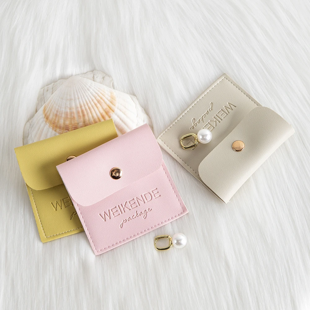 

Custom Wholesale Jewelry Bag Pouch Pu Leather Jewellry Packaging Snap Pouches with logo for Bracelet Ring Necklace Pink Sack