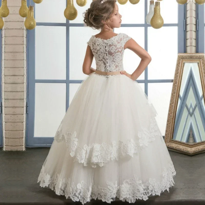 Abiti da ragazza di fiore in tulle con applicazioni gonfie in pizzo con fiocco senza maniche per matrimoni, feste di compleanno, spettacoli, abiti da prima comunione