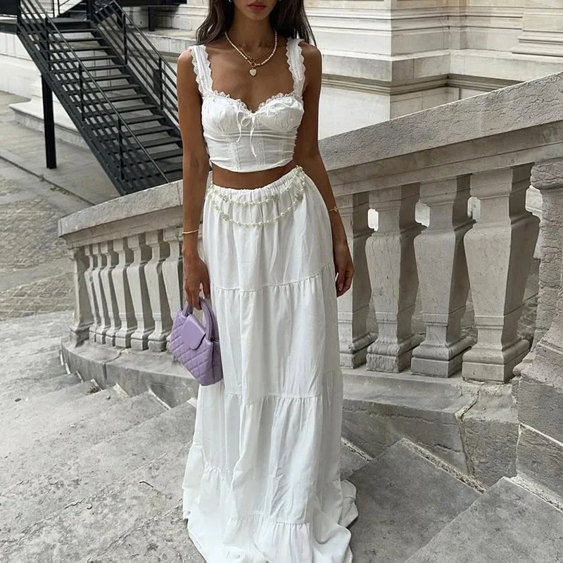 Seksowny komplet: koronkowa bluzka na ramiączkach z odkrytymi ramionami i długa spódnica, elegancki strój damski z wysokim stanem w stylu college, codzienny, bez rękawów, jednolity kolor, zestaw 2-częściowy.