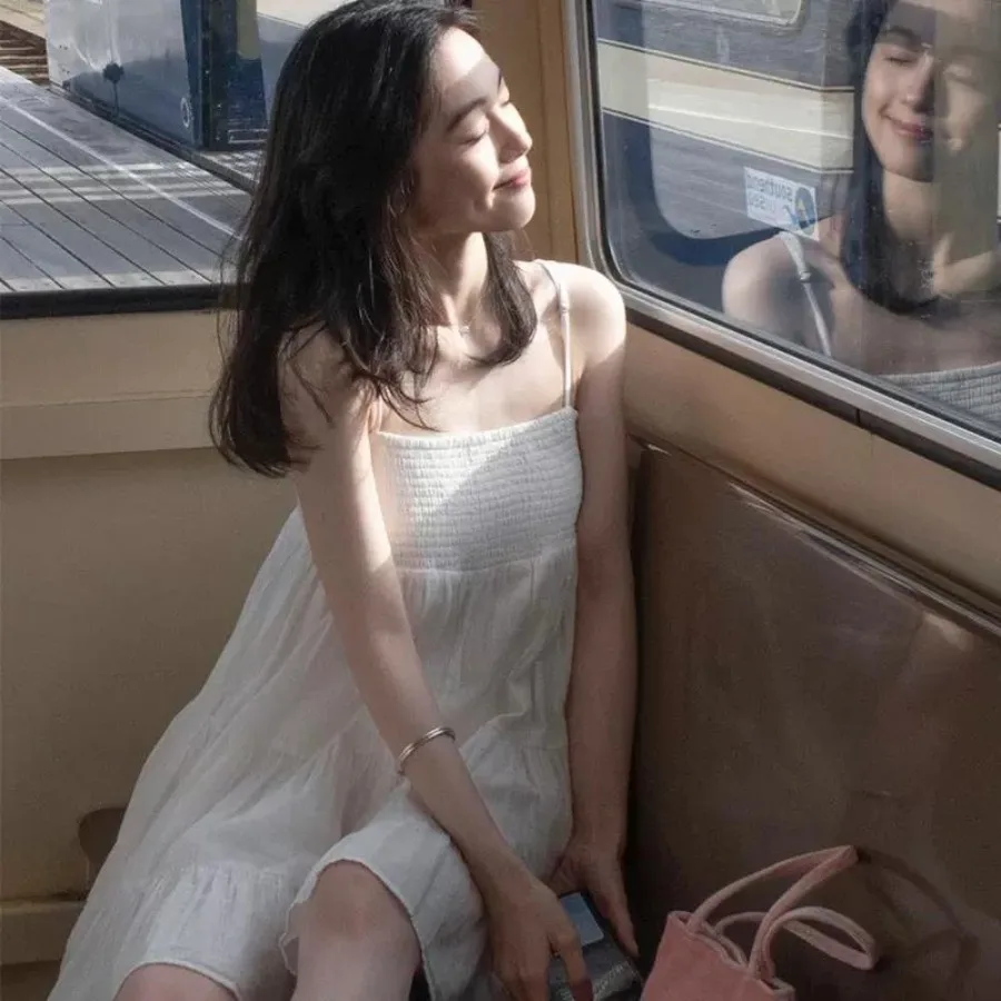 

【New style】Real price beach dress seaside vacation dress super hot first love white suspender dress female summer small