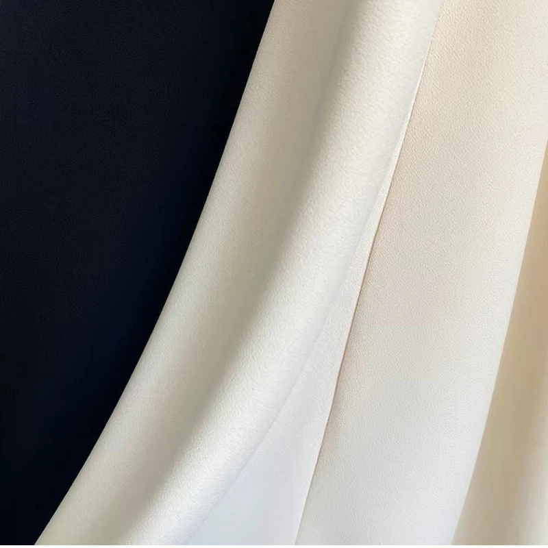 تنورة متوسطة الطول كلاسيكية على الطراز الأوروبي والأمريكي بعمر 25 عامًا بلون سادة معلقة بخصر عالٍ