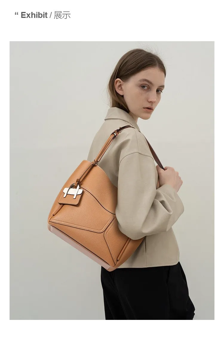 

Кожаная сумка-клатч премиум-класса, вместительный внутренний отдел с надежной застежкой, регулируемый плечевой ремень, повседневный шик, новинка 2026 года