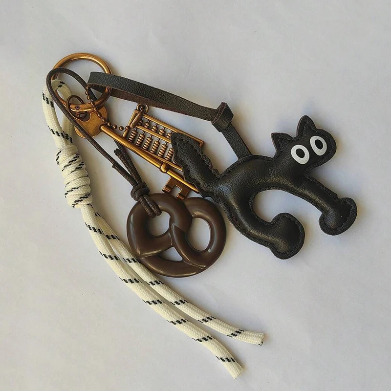 الكلاسيكية لطيف بو الجلود القط شكل المفاتيح قلادة جميلة سيارة حلقة رئيسية حقيبة سحر الهاتف قلادة حلية حلقة رئيسية الملحقات