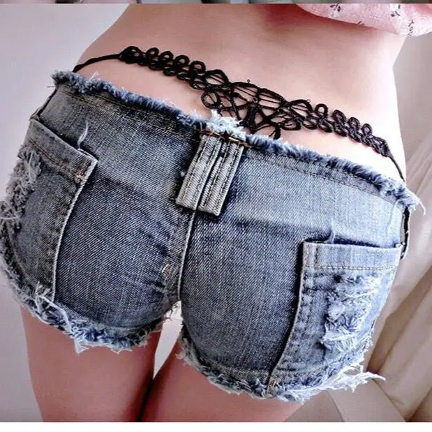 Denim shorts katoenen elastische franjes, nostalgische kleuren gewassen nachtclubs paaldansen hete meisjes strakke hotpants met lage taille 2025