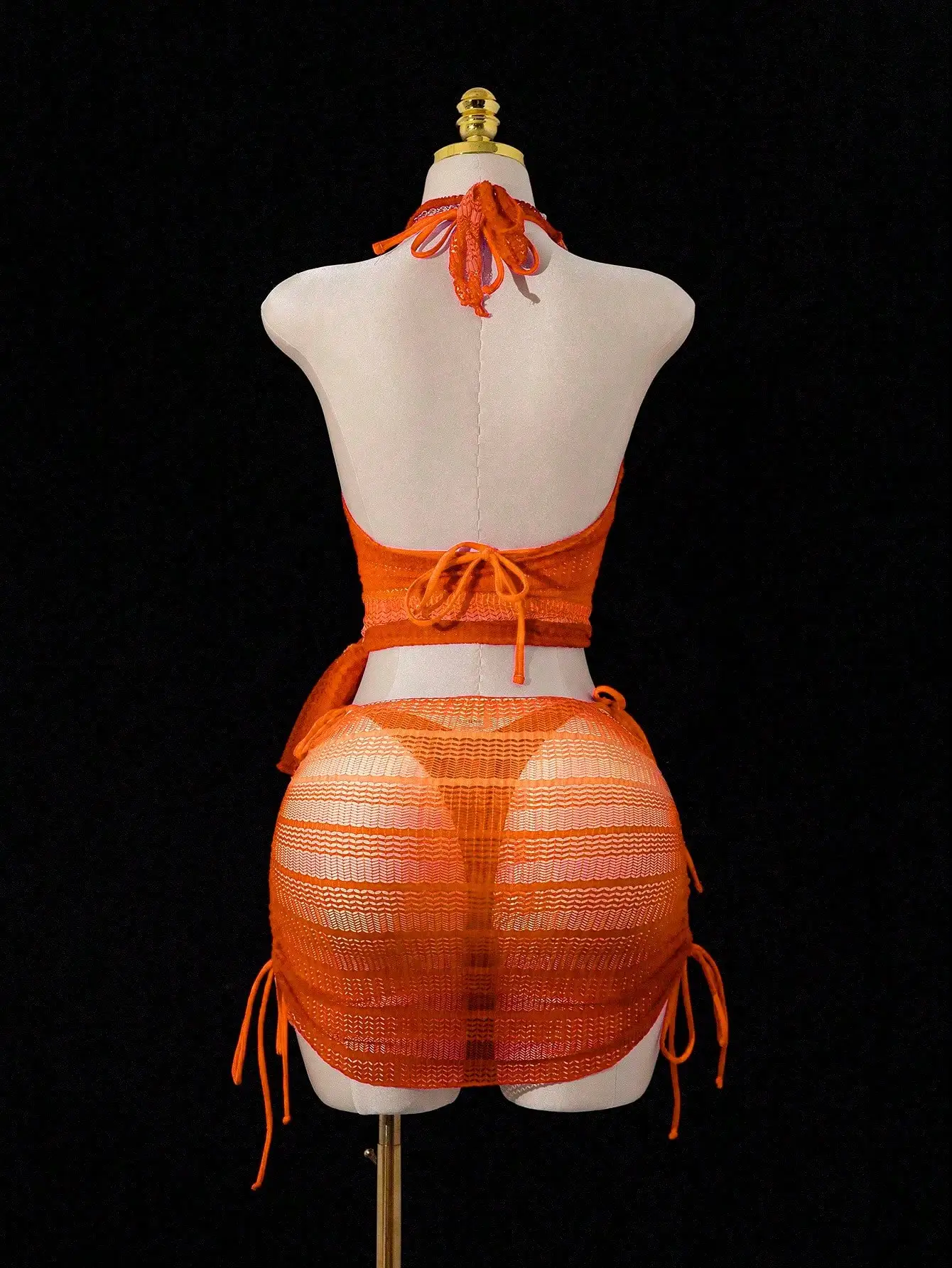 

Orange Knit Halter Neck Bikini Set With Side Tie Mini Skirt And Shorts