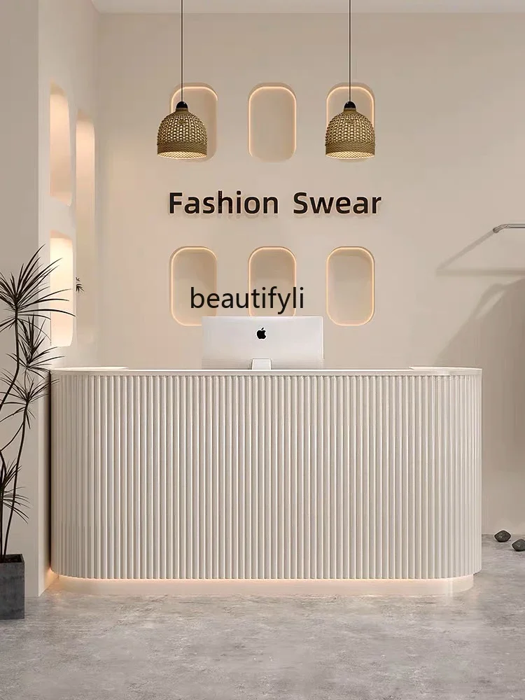 Beauty salon checkout page Simple modern clothing store Women's clothing store Small counter Yoga studio, reception desk