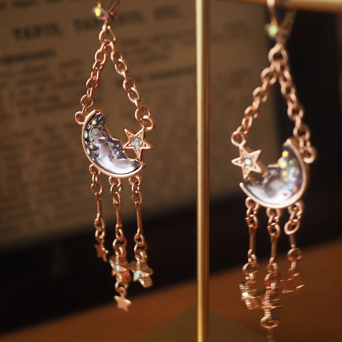 

Relief Vintage Designer Tassel Moon Moonglow Face Niche Earrings